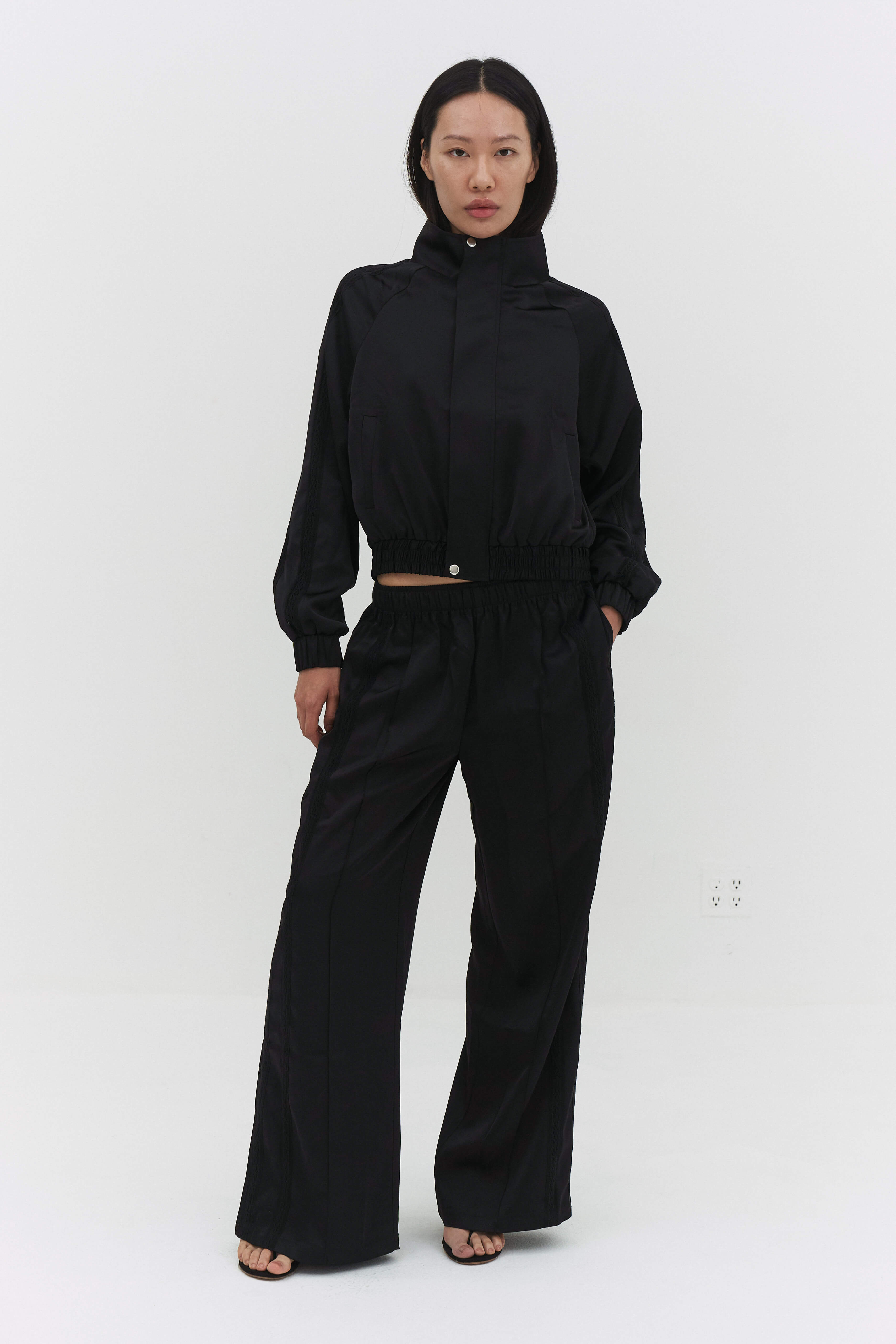 LEISEU TRACK PANTS IN BLACK